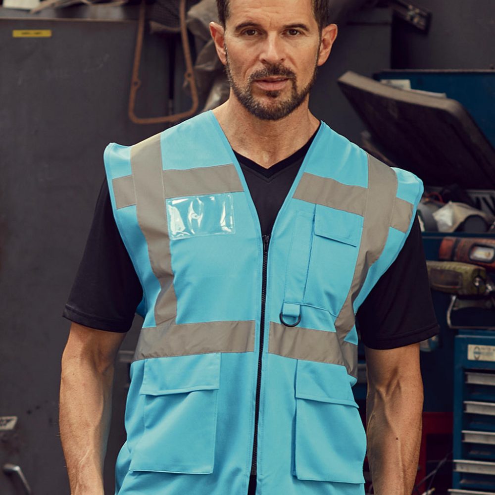 421_77_329_m-2019_01 Warnweste Fluo mit Taschen & Reißverschluss